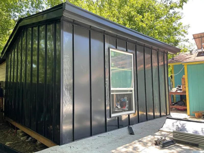 Black standing seam metal wall panels for Metal Roof Installation in Pittsfield